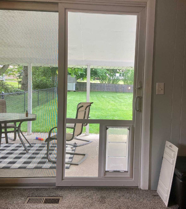 glass sliding door with dog door